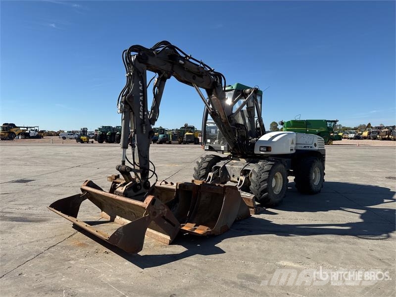 Mecalac 12MTX حفارات بعجل