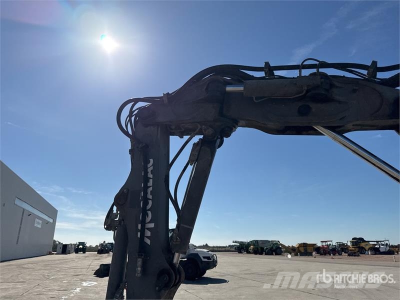 Mecalac 12MTX حفارات بعجل