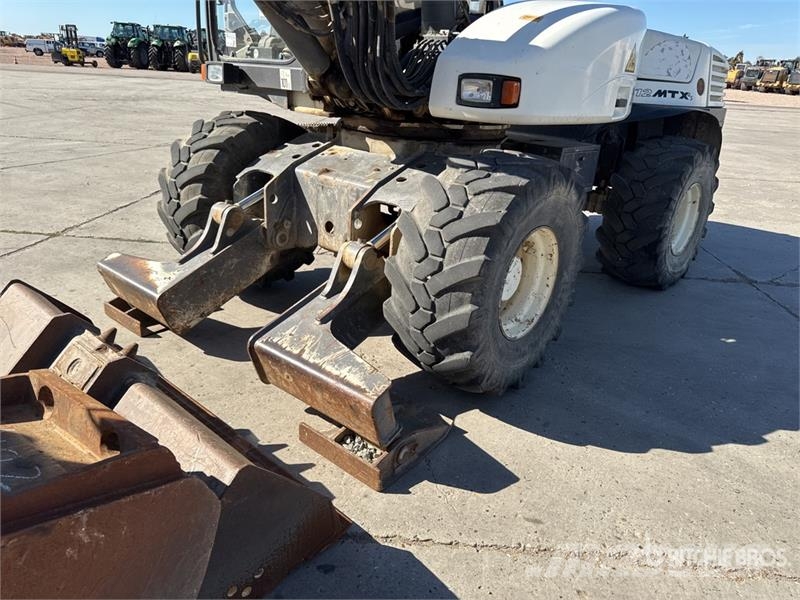 Mecalac 12MTX حفارات بعجل