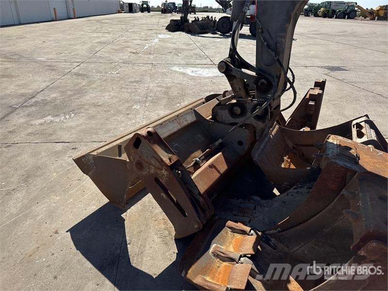 Mecalac 12MTX حفارات بعجل