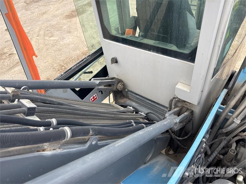 Terex Fuchs MHL320 Pelle De Manutention Wheel Material Handler معدات البناء - غير ذلك