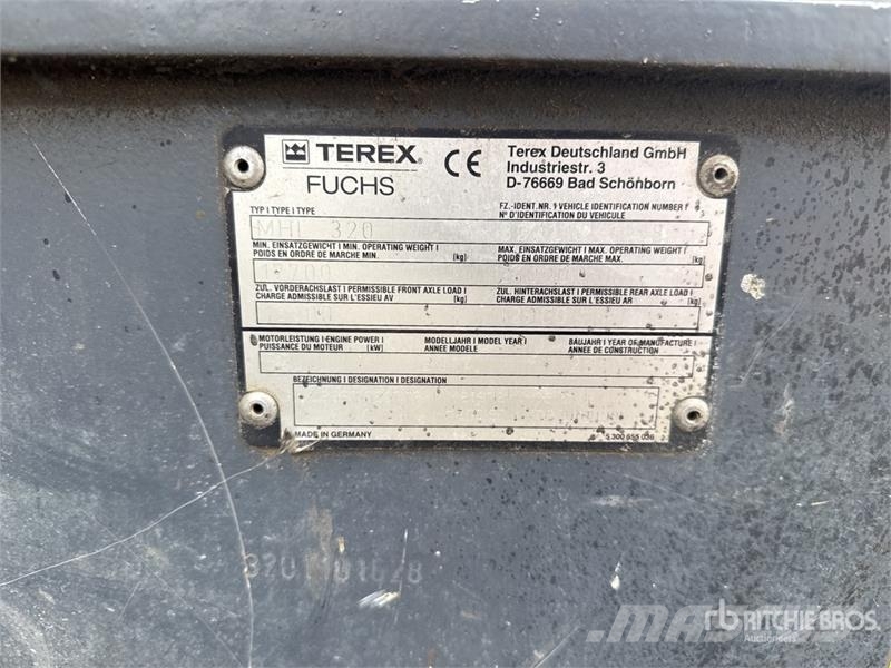 Terex Fuchs MHL320 Pelle De Manutention Wheel Material Handler معدات البناء - غير ذلك