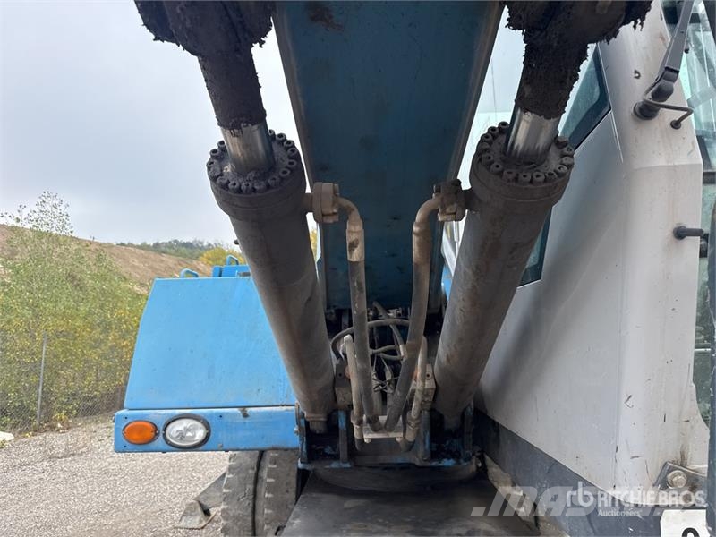 Terex Fuchs MHL320 Pelle De Manutention Wheel Material Handler معدات البناء - غير ذلك
