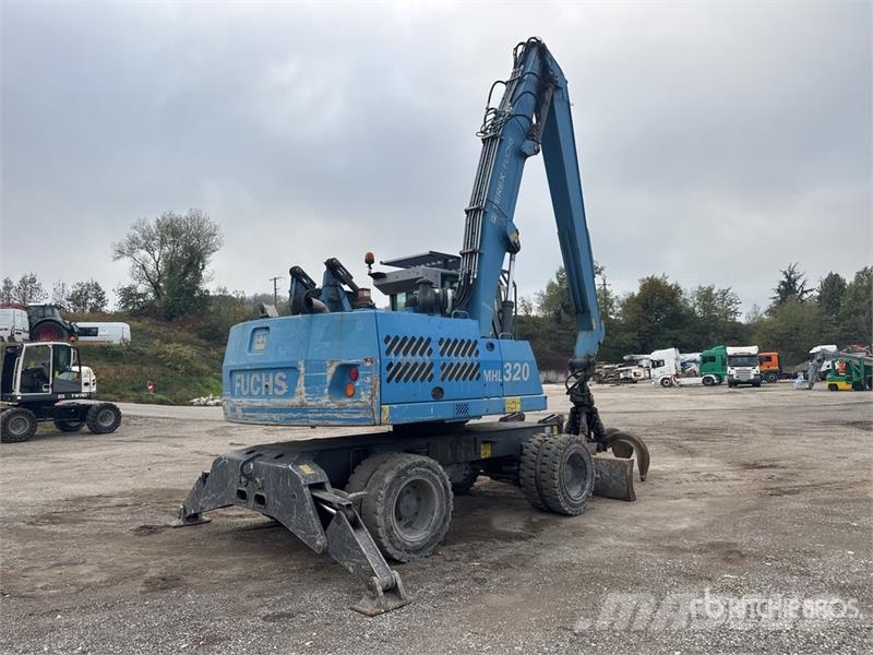 Terex Fuchs MHL320 Pelle De Manutention Wheel Material Handler معدات البناء - غير ذلك