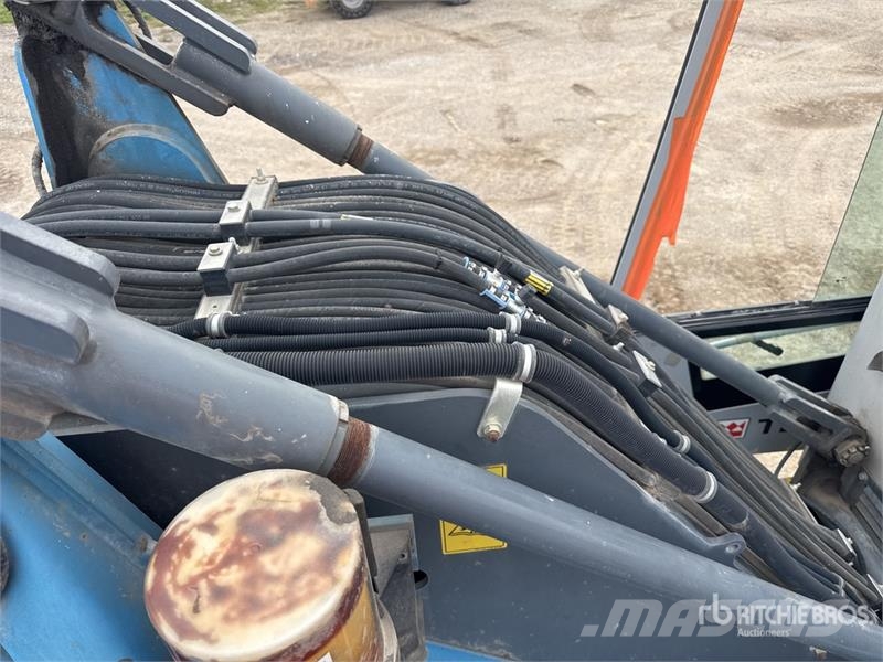 Terex Fuchs MHL320 Pelle De Manutention Wheel Material Handler معدات البناء - غير ذلك