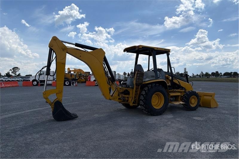 CAT 416D Екскаватори-навантажувачі