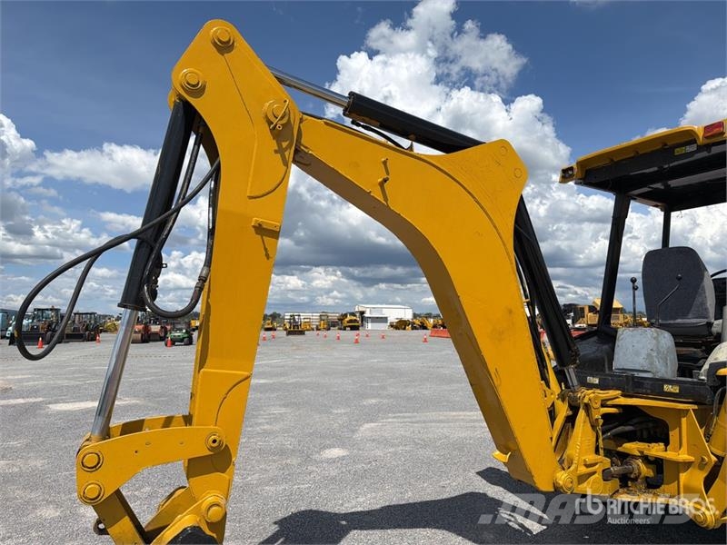 CAT 416D Екскаватори-навантажувачі