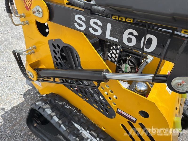  SSL60 Mini Minicargador (Sin Usar) / Mini Compact  لوادر انزلاقية التوجيه