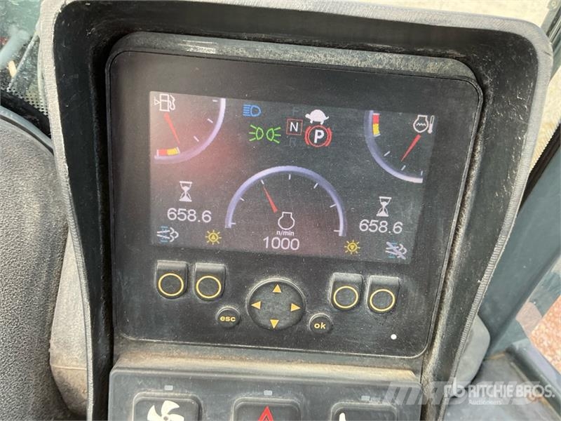 Gehl AL650 لوادر بعجل
