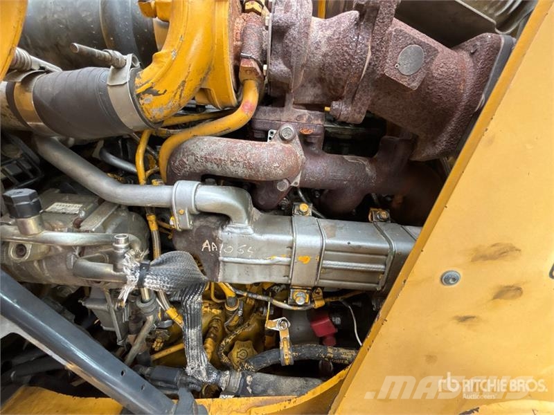 John Deere 410K Traktorgravere