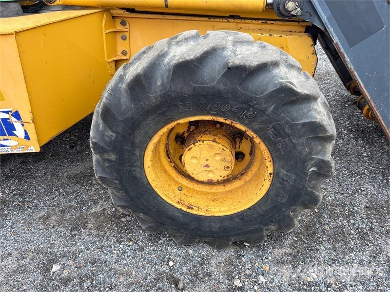 John Deere 410K Traktorgravere