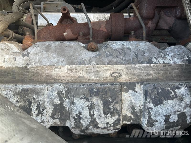 Mack CV713 Granite 8x4 Roll-Off Truck (Inoperable) Skip loader