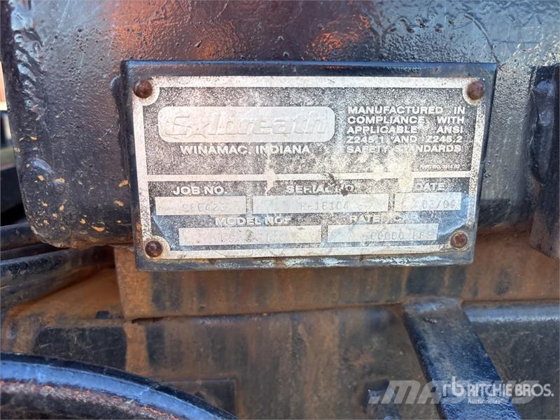 Mack DM690S Skip bin truck