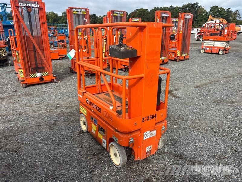 Snorkel TM12 Electric Vertical Mast Lift Вертикальные мачтовые подъемники