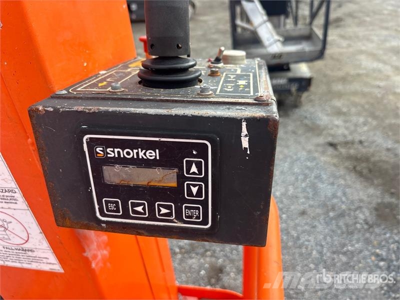 Snorkel TM12 Electric Vertical Mast Lift Вертикальные мачтовые подъемники
