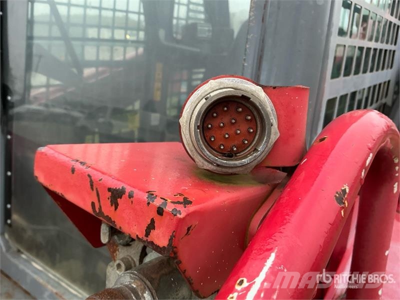Takeuchi TL10 Skid steer mini nakladalci