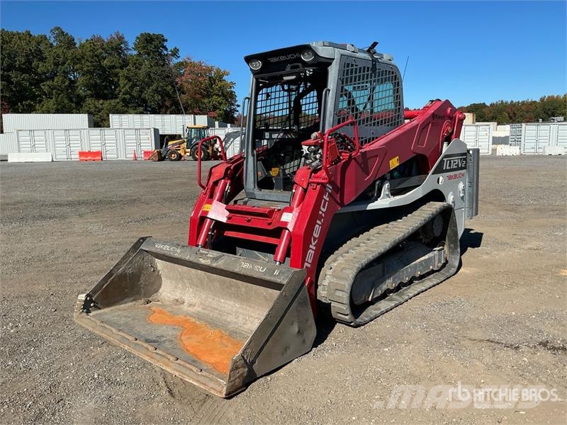 Takeuchi TL12V2 لوادر انزلاقية التوجيه