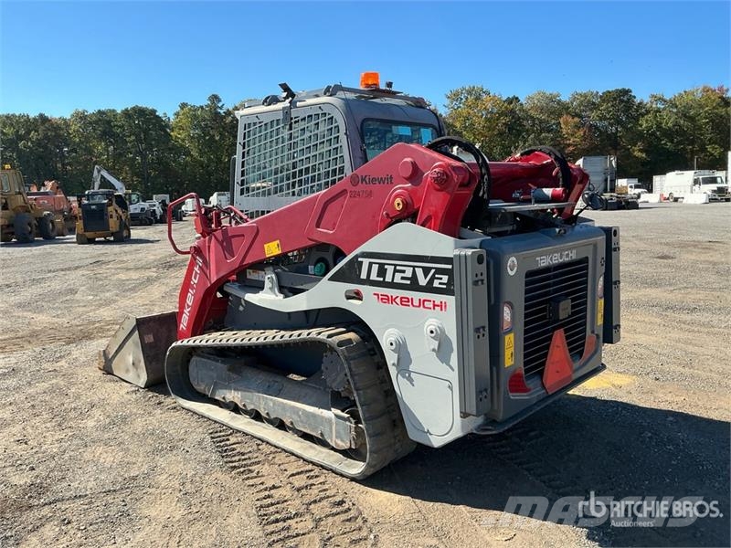Takeuchi TL12V2 لوادر انزلاقية التوجيه