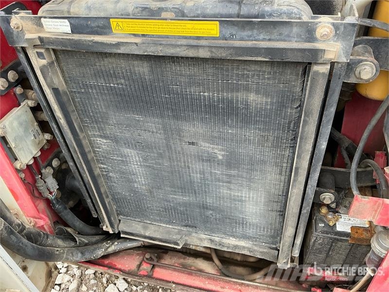 Takeuchi TL140 Мини-погрузчики