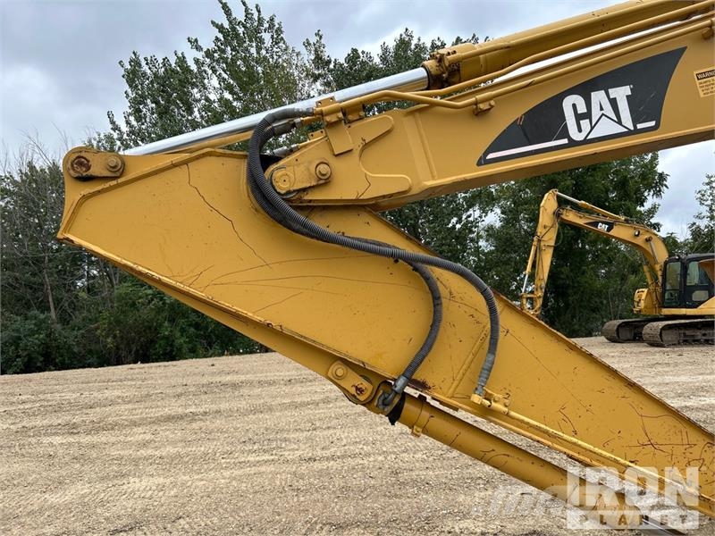 CAT 318C Гусеничні екскаватори