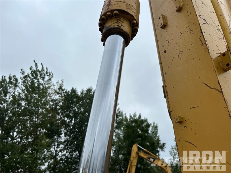 CAT 318C Гусеничні екскаватори