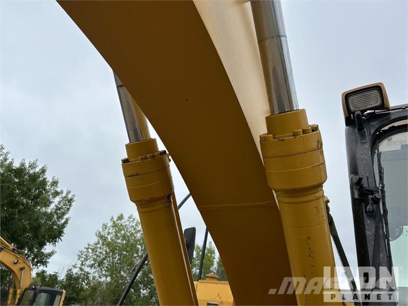 CAT 318C Гусеничні екскаватори