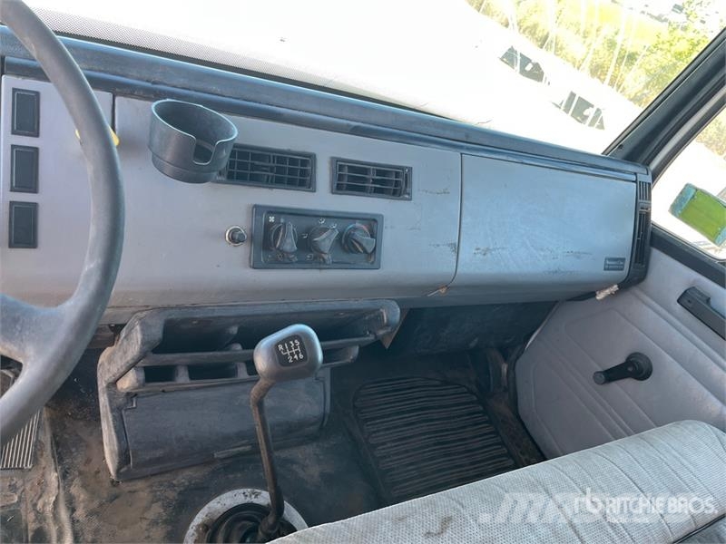 Freightliner FL 70 Tovornjaki za žagovino