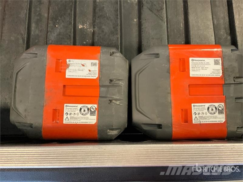 Husqvarna of (2) Husqvarna B750X Batteries Other components