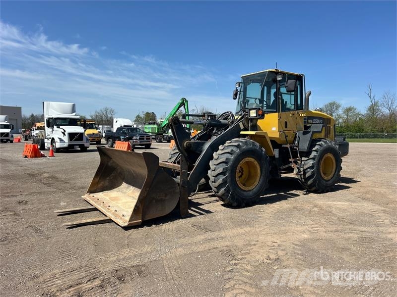 Purchase Komatsu WA250PZ-6 wheel loaders, Bid & Buy on Auction