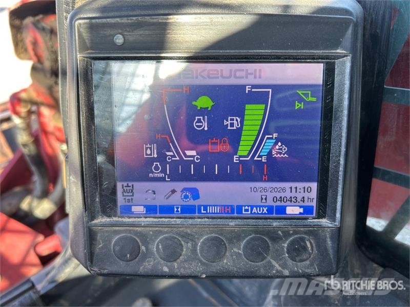Takeuchi TL12V2 لوادر انزلاقية التوجيه