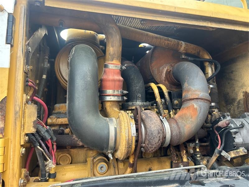 CAT 140H Motor Grader Грейдери
