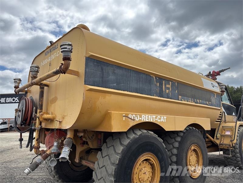 CAT 725 5000 gal 6x6 Articulated Water Truck Ūdens mašīnas