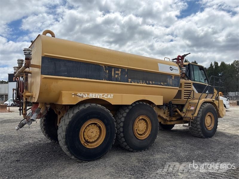 CAT 725 5000 gal 6x6 Articulated Water Truck Ūdens mašīnas
