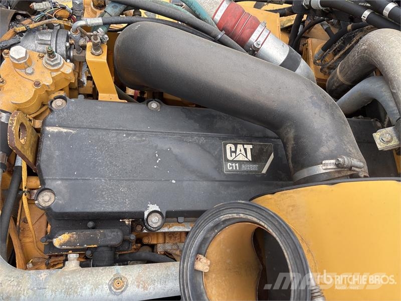 CAT 725 5000 gal 6x6 Articulated Water Truck Ūdens mašīnas