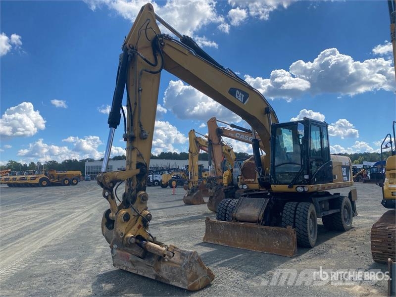CAT M318D Gravemaskiner på hjul