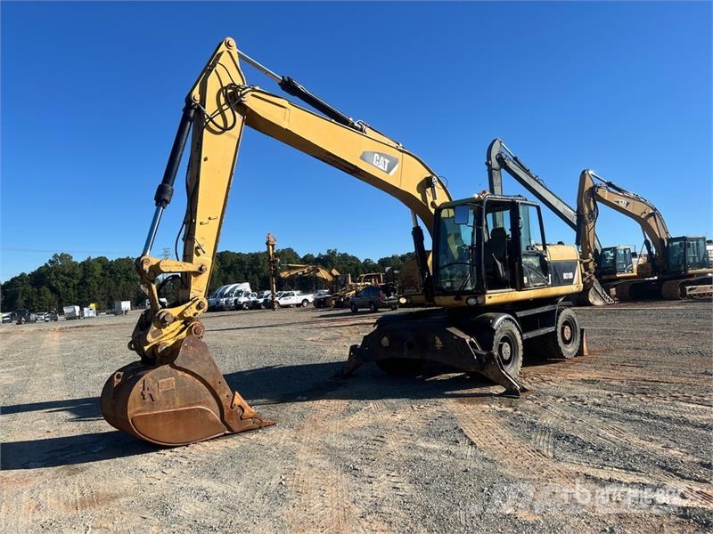 CAT M318D Gravemaskiner på hjul