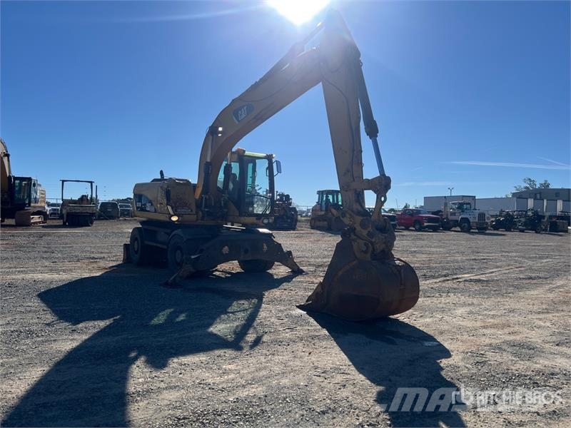 CAT M318D Gravemaskiner på hjul