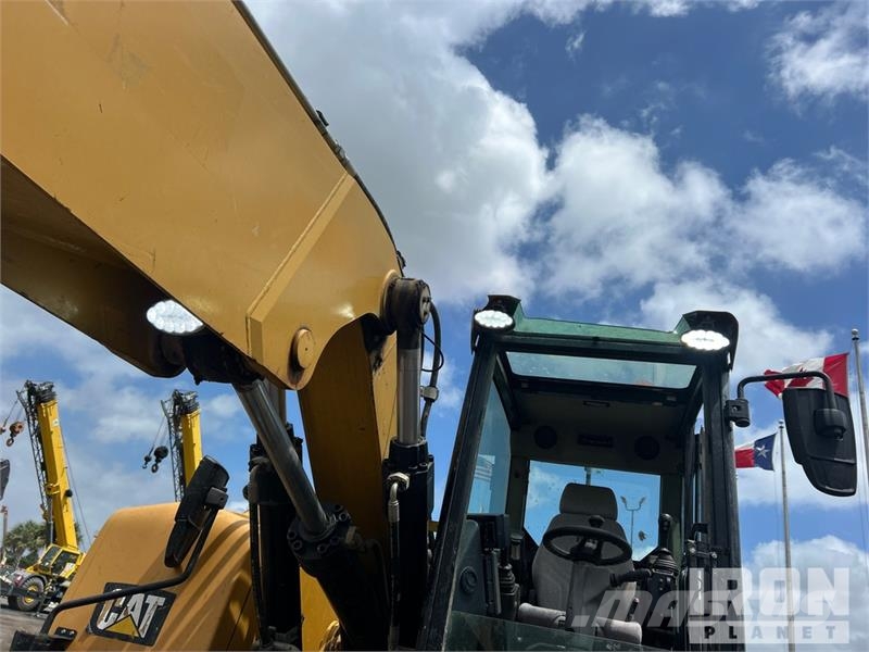 CAT M318F Wheel Excavator Bagri na kolesih