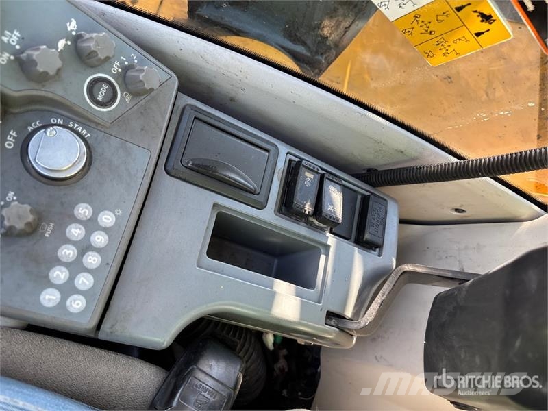 John Deere 135G Bagri goseničarji