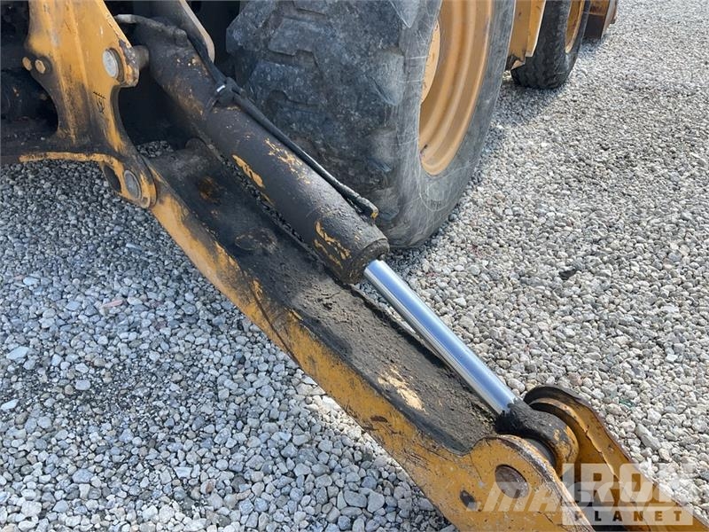 John Deere 310SL Экскаваторы-погрузчики