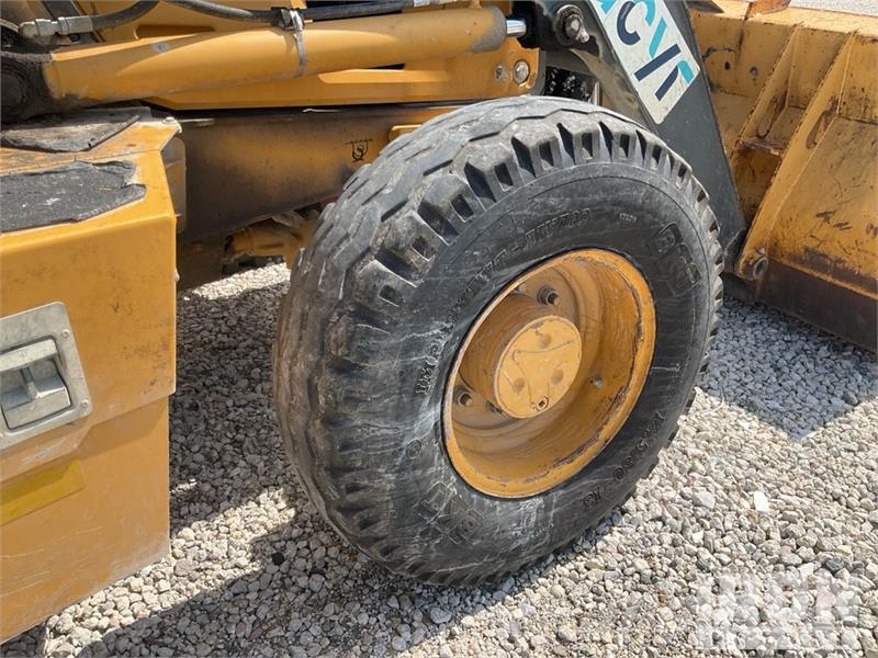 John Deere 310SL Экскаваторы-погрузчики