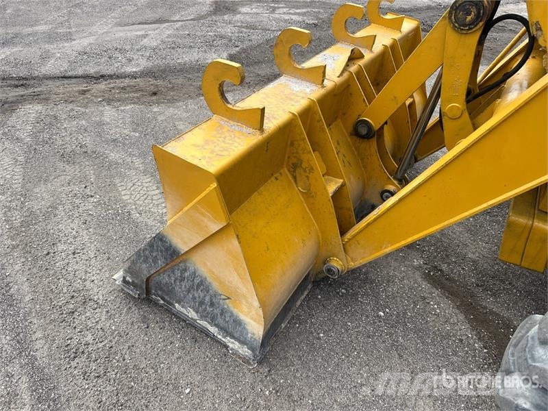 John Deere 410G Ekskavatori-iekrāvēji