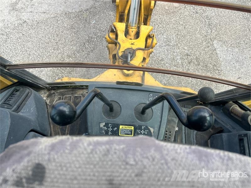 John Deere 410G Ekskavatori-iekrāvēji