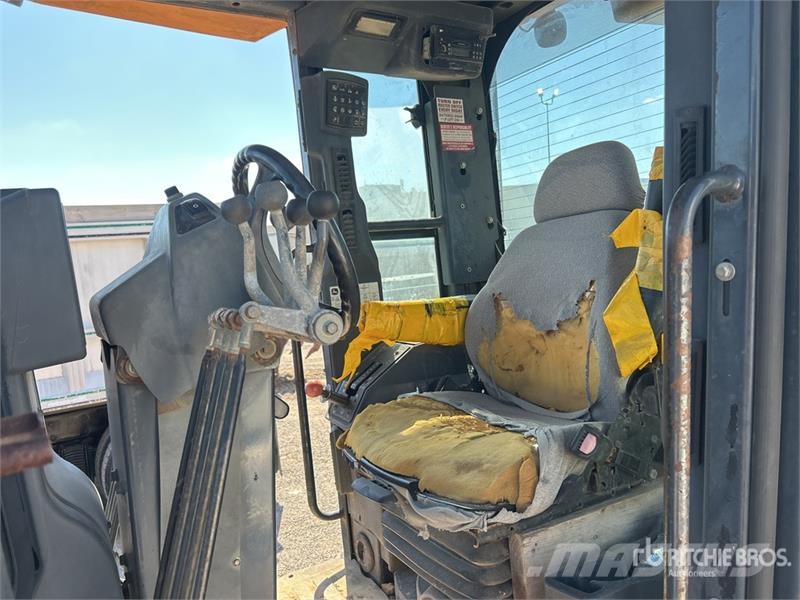 John Deere 672D Грейдери