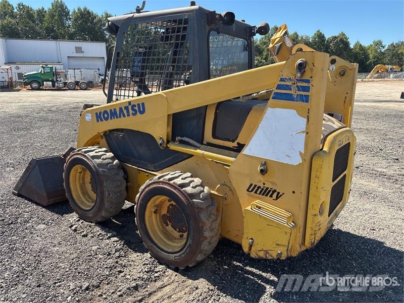Komatsu SK815-5 Mini Pale Gommate