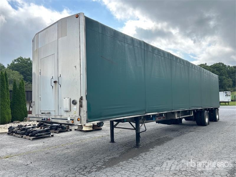 MAC TNAR48AA 48 ft T/A Flatbed Trailer Platformas/izkraušana no sāniem