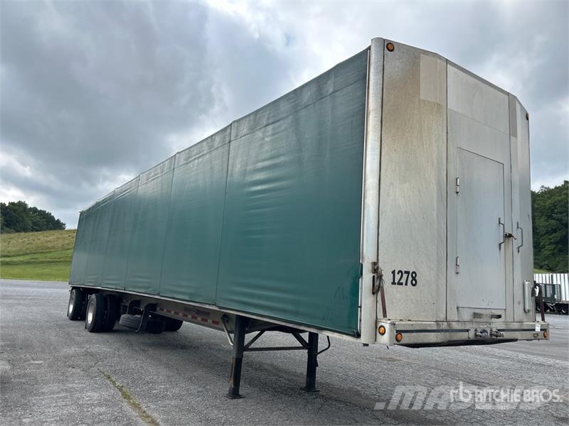 MAC TNAR48AA 48 ft T/A Flatbed Trailer Platformas/izkraušana no sāniem
