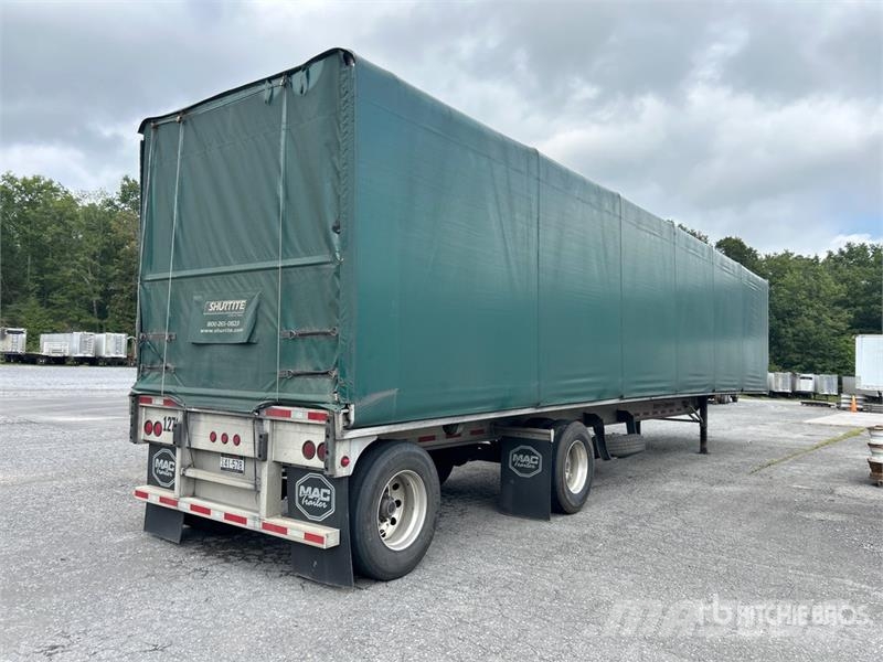 MAC TNAR48AA 48 ft T/A Flatbed Trailer Platformas/izkraušana no sāniem