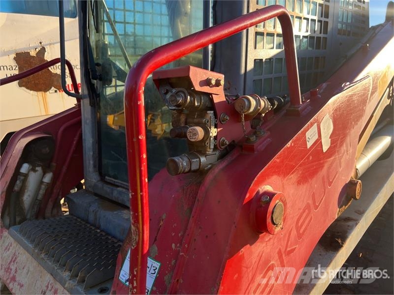 Takeuchi TL12 لوادر انزلاقية التوجيه