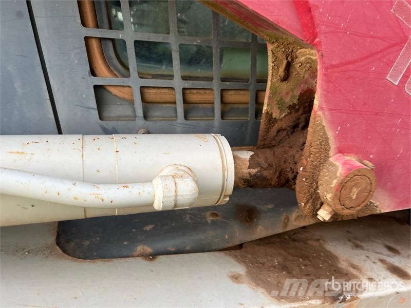 Takeuchi TL12 لوادر انزلاقية التوجيه